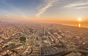 Agbar Tower Prints: Aerial drone shot of agbar tower by Barcelona beach with sunrise