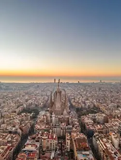 Gaudi Prints: Aerial drone shot of Barcelona city before sunrise golden hour