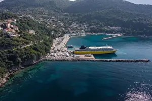 Cephalonia Prints: aerial drone shot of big cruise ship haled in Poros port of Kefalonia island in Greece