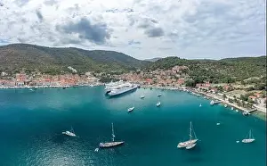 Riva Prints: Aerial drone shot of cruise ferry at Adriatic sea port on Vis Island in Croatia summer