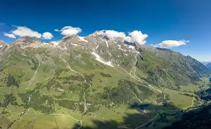 Aerial drone shot of Grossglockner mountain range valley in summer in Austria