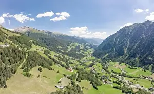 Hohe Tauern Prints: Aerial drone shot of Helligenblutt village in Grossglockner mountain valley in Austria