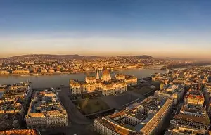 Morning Glow Prints: Aerial drone shot of Hungarian Parliament building during sunrise in Budapest Danube river