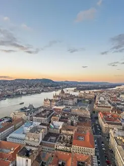 Neo Gothic Prints: Aerial drone shot of Hungarian Parliament Kossuth Square by Danube river in Budapest sunset