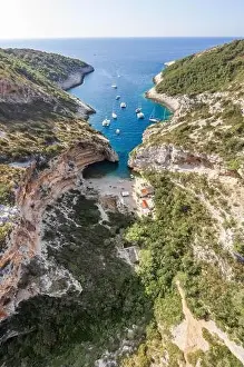 Aerial drone shot of iconic Stiniva cove beach of Adriatic sea on Vis Island in Croatia summer