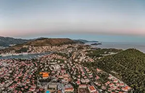 Dalmatian Coast Prints: Aerial drone shot of Lapa Gruz port in Dubrovnik in Croatia summer sunset