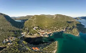 Dubrovnik Prints: Aerial drone shot of Mali Ston village with City Wall of Ston in Ragusa near Dubrovnik in Croatia summer sunrise