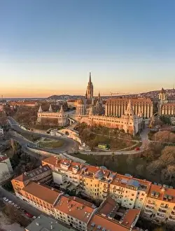 Morning Glow Prints: Aerial drone shot of Matthias Church on Buda hill during Budapest sunrise at dawn