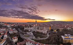 Beautiful Sky Prints: Aerial drone shot of Matthias Church Fisherman's Bastion on Buda Hill in Budapest sunset time