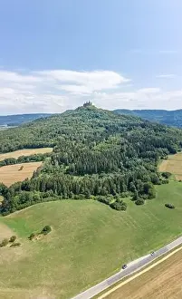 Baden Wurttemberg Prints: Aerial drone shot of Medival Hohenzollern Castle on hill near Stuttgart at summer noon