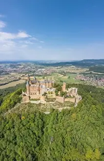 Baden Wurttemberg Prints: Aerial drone shot of Medival Hohenzollern Castle on hill near Stuttgart at summer noon