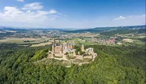 Baden Wurttemberg Prints: Aerial drone shot of Medival Hohenzollern Castle on hill near Stuttgart at summer noon
