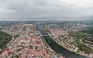 Heidelberg Prints: Aerial drone shot of Neckar river through Heidelberg new town in overcast summer morning