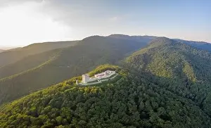 Sunset Tower Prints: Aerial drone shot of Oltar Domovine ston fortress castle on top of Zagreb uptown hill