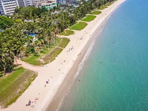 Aerial drone shot of Sanya bay beach with tourists in Sanya city Hainan island China