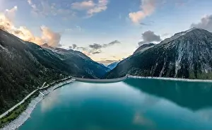 Austrian Alps Prints: Aerial drone shot of Schlegeisspeicher resevoir with galcier view at dusk