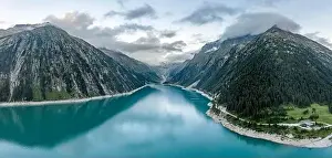 Austrian Alps Prints: Aerial drone shot of Schlegeisspeicher resevoir with galcier view at dusk
