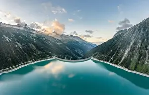 Austrian Alps Prints: Aerial drone shot of Schlegeisspeicher resevoir with galcier view at dusk