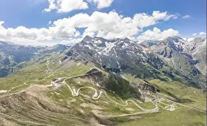 Tirol Prints: Aerial drone shot of serpentine high alpine road Taxenbacher Fusch below Edelweissspitze in Grossglockner in Austria