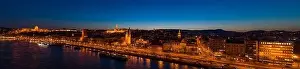 Beautiful Sky Prints: Aerial drone shot of St. Anne Parish church by Danube river at Budapest dusk city lights