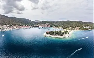 Riva Prints: Aerial drone shot of St. Jeronima church on Vis Island coastline by adriatic sea in summer