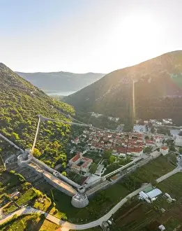 Ragusa Prints: Aerial drone shot of Ston city wall over hill in Ragusa region near Dubrovnik in Croatia summer sunrise