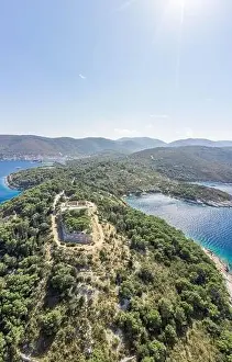 Vis Island Prints: Aerial drone shot of stone Fort George Croatia on top of hill in Adriatic sea on Vis Island in summer