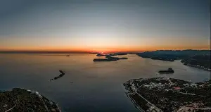 Dalmatian Coast Prints: Aerial drone shot of sunset over Adriatic sea vie from Babin Kuk hill in Dubrovnik Croatia summer