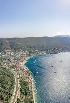 Helipad Prints: Aerial drone shot of town port Adriatic coastline on Vis Island in Croatia summer