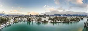 Magic Hour Prints: Aerial drone shot view of Leopoldskroner lake southwest of outskirts of Salzburg during winter