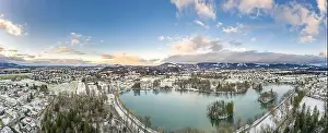 Magic Hour Prints: Aerial drone shot view of Leopoldskroner lake southwest of outskirts of Salzburg during winter