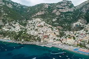 Amalfi Prints: Aerial drone shot view of Positano village and beach in the morning in Amalfi Coast
