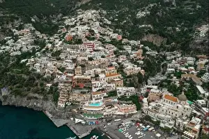Amalfi Prints: Aerial drone shot view of Positano village and beach in the morning in Amalfi Coast