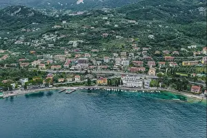 Lake Garda Prints: Aerial drone shot view of village Malcesine coastline by lake garda