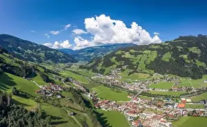 Zillertal Prints: Aerial drone shot of Zillertal valley with clouds in Tyrol Austria summer