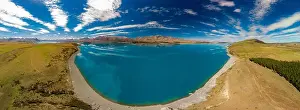 Aoraki Prints: Aerial drone shots of beautiful Lake Tekapo with reflection of sky and mountains