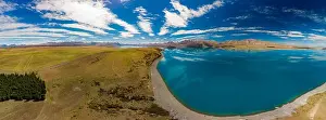 Aoraki Prints: Aerial drone shots of beautiful Lake Tekapo with reflection of sky and mountains