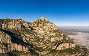 Benedictine Prints: Aerial drone view of Abbey of Montserrat mountain near Barcelona in morning sunrise