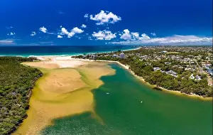 Aerial drone view of beach and Currimundi Lake, Caloundra, Sunshine Coast, Queensland, Australia