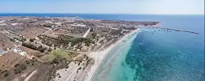 Aerial drone view of the beach and harbour of Portopalo di Capo Passero