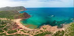 Aerial drone view of Cala del Pilar beach scenery on north cost of Menorca, near Ferreries