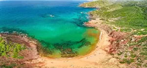 Aerial drone view of Cala del Pilar beach scenery on north cost of Menorca, near Ferreries