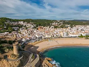 Costa Brava Prints: Aerial drone view of the coastal town named Tossa de Mar with a beach and castle