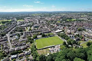 Above View Prints: Aerial drone top view of football soccer field with people playing