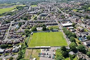 Above View Prints: Aerial drone top view of football soccer field with people playing
