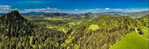 Tatra Prints: Aerial drone view over green hills of Pieniny National Park and snowy Tatra Mountains