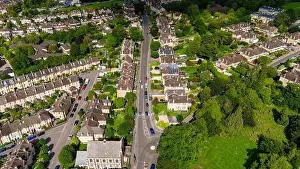 Aerial drone view looking up Newbridge Hill, heading out of the City of Bath, UK. (22-08-2023)