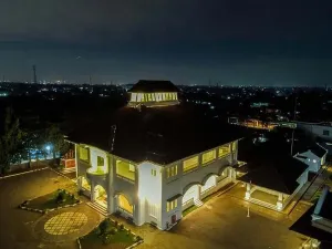 Tower Park Prints: Aerial drone view of Monument Gedung Juang is one of historical building in Tambun at night