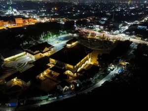 Tower Park Prints: Aerial drone view of Monument Gedung Juang is one of historical building in Tambun at night