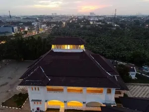 Landmark Tower Prints: Aerial drone view of Monument Gedung Juang is one of historical building in Tambun at night